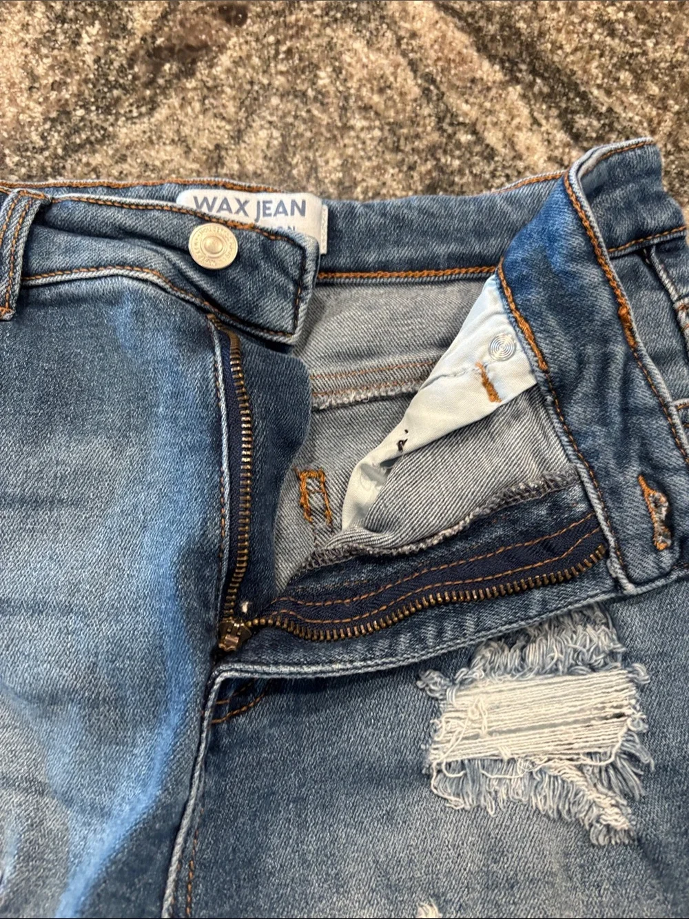 High-Rise Distressed Denim Shorts in Blue Wax Jean size medium